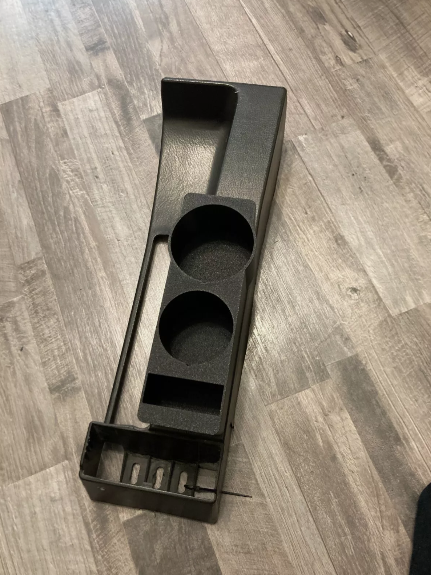 BMW E30 cup holders in center console top view 