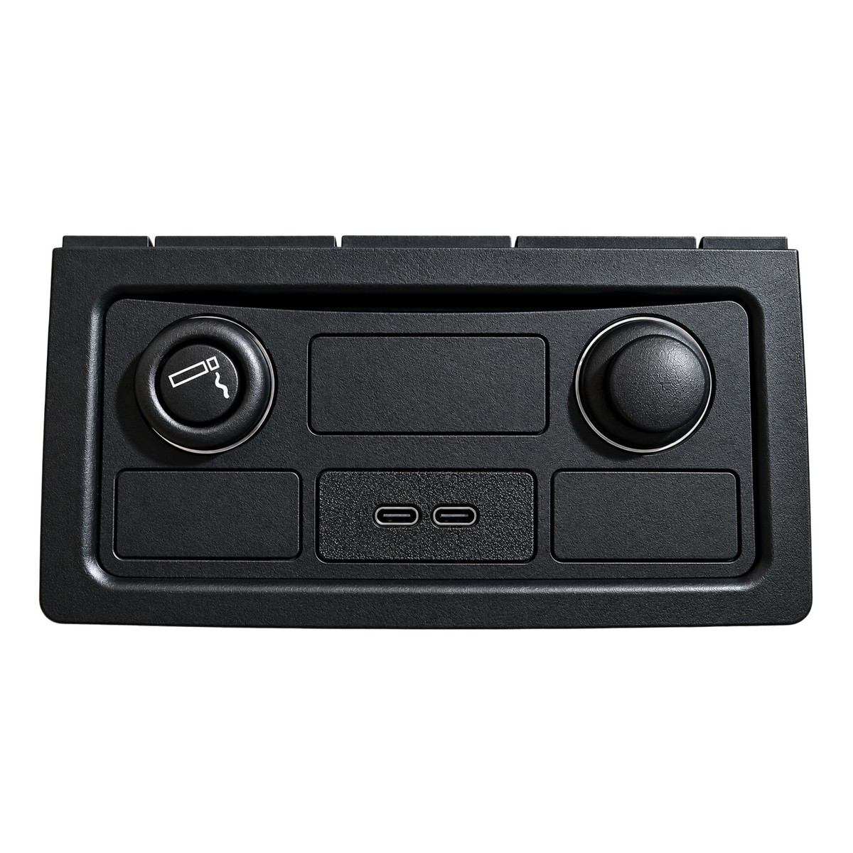 A black plastic control panel or console cover with two circular buttons, recessed slots, and two USB-C ports, shown on a plain white background.